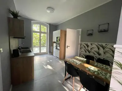 Kuchnia lub aneks kuchenny w obiekcie Duży Apartament - Stare Miasto - 12 osób - 6 łóżek