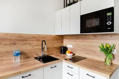 Kuchnia lub aneks kuchenny w obiekcie Loft City Center Apartments- Parking, Wifi, 24h Check-In