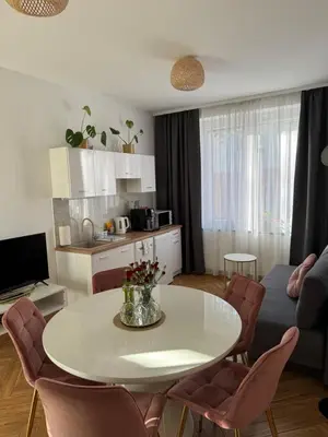 Kuchnia lub aneks kuchenny w obiekcie Dawna Mleczarnia Apartamenty SOSNOWY