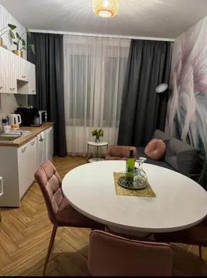 Kuchnia lub aneks kuchenny w obiekcie Dawna Mleczarnia Apartamenty SOSNOWY