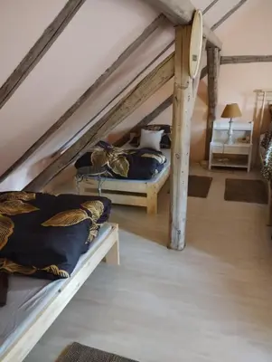 Łóżko lub łóżka w pokoju w obiekcie U Joli
