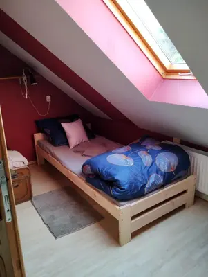 Łóżko lub łóżka w pokoju w obiekcie U Joli