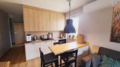 Kuchnia lub aneks kuchenny w obiekcie Apartament 31 z Sauną Rowery, Spacery w Dolinie Baryczy - 5D Apartamenty