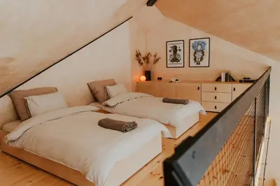 Łóżko lub łóżka w pokoju w obiekcie Błogostan