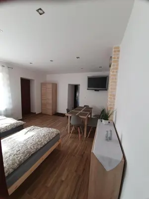 Łóżko lub łóżka w pokoju w obiekcie Apartament Mickiewicza