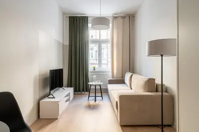 Telewizja i/lub zestaw kina domowego w obiekcie RentPlanet - Apartamenty Śródmieście
