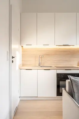 Kuchnia lub aneks kuchenny w obiekcie RentPlanet - Apartamenty Śródmieście
