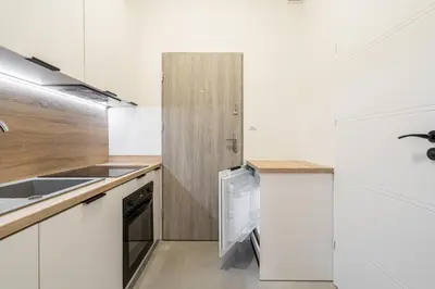 Kuchnia lub aneks kuchenny w obiekcie RentPlanet - Apartamenty Śródmieście