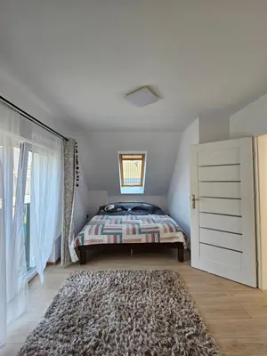 Łóżko lub łóżka w pokoju w obiekcie Dom z Widokiem na Góry i Jacuzzi - 