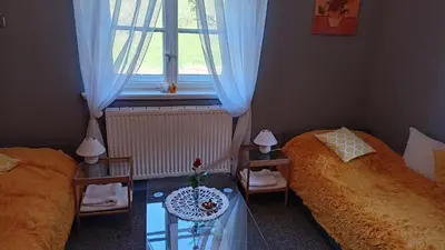 Łóżko lub łóżka w pokoju w obiekcie Pod Małą Sową