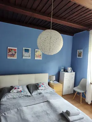 Łóżko lub łóżka w pokoju w obiekcie Pod Małą Sową