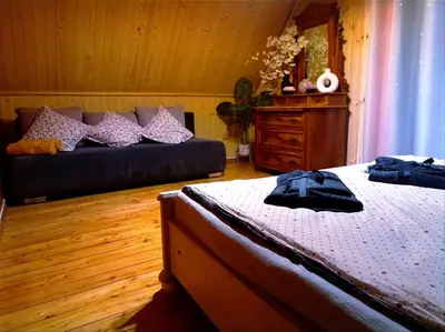 Łóżko lub łóżka w pokoju w obiekcie Lawendowe wzgórze