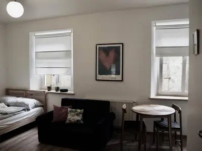 Łóżko lub łóżka w pokoju w obiekcie Apartament Piękna 4