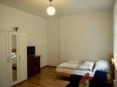 Łóżko lub łóżka w pokoju w obiekcie Apartament Piękna 4