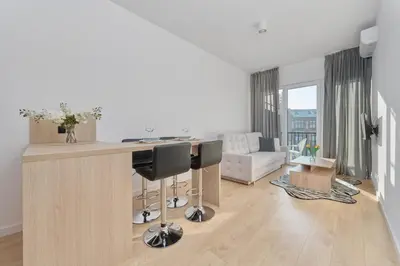Część wypoczynkowa w obiekcie Tasteful Apartment with FREE GARAGE and Balcony by Noclegi Renters