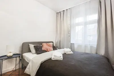 Łóżko lub łóżka w pokoju w obiekcie Widok na Marinę Rynek