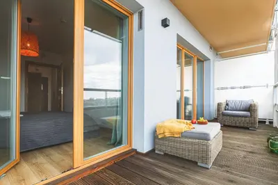 Część wypoczynkowa w obiekcie Ekskluzywny apartament z balkonem
