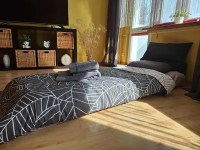 Łóżko lub łóżka w pokoju w obiekcie Róża Południa