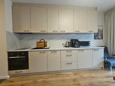 Kuchnia lub aneks kuchenny w obiekcie City Sense New Apartments - Main Station and City Center