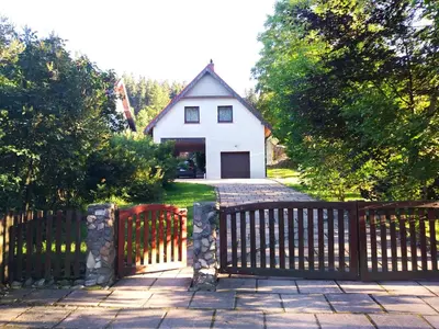 Ogród w obiekcie Apartament W Dolinie Modrzewi