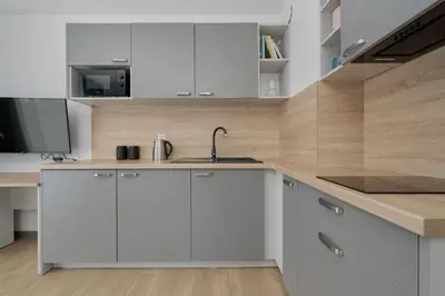 Kuchnia lub aneks kuchenny w obiekcie Cozy & Modern Studio Rogowska by Noclegi Renters