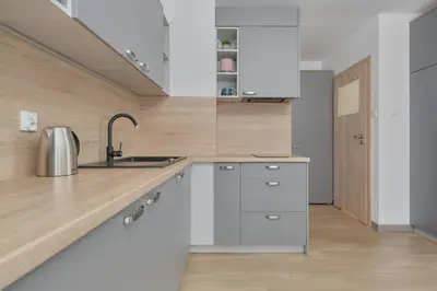 Kuchnia lub aneks kuchenny w obiekcie Cozy & Modern Studio Rogowska by Noclegi Renters
