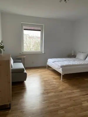 Łóżko lub łóżka w pokoju w obiekcie Apartament Otwarta Wrocław