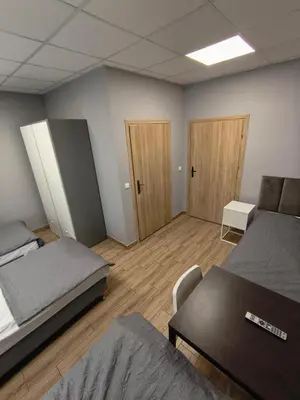 Łóżko lub łóżka w pokoju w obiekcie Ząbkowickie Centrum Sportu i Rekreacji Sp. z o. o.