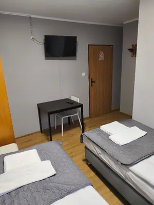 Łóżko lub łóżka w pokoju w obiekcie Ząbkowickie Centrum Sportu i Rekreacji Sp. z o. o.