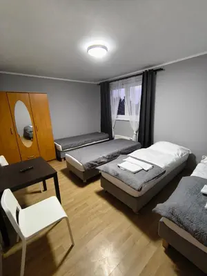 Łóżko lub łóżka w pokoju w obiekcie Ząbkowickie Centrum Sportu i Rekreacji Sp. z o. o.