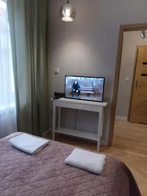 Telewizja i/lub zestaw kina domowego w obiekcie Apartament Marzenie 1 i 2 by Apartamenty na dni Wrocław