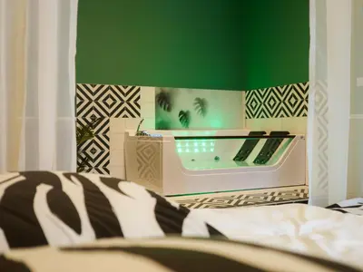 Łóżko lub łóżka w pokoju w obiekcie Punkt - Apartament z jacuzzi w centrum Gliwic