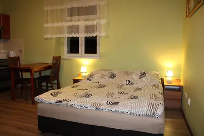 Łóżko lub łóżka w pokoju w obiekcie Apartament 2-pokojowy 55 m2, koło ZOO, Hali Stulecia