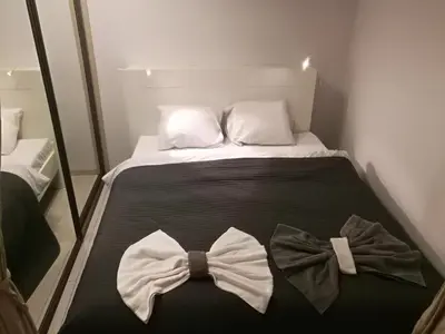 Łóżko lub łóżka w pokoju w obiekcie Apartments 4 You