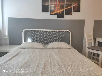 Łóżko lub łóżka w pokoju w obiekcie Apartments 4 You