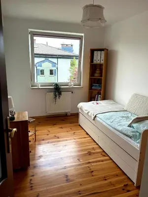 Łóżko lub łóżka w pokoju w obiekcie Apartament Kozia