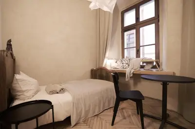 Łóżko lub łóżka w pokoju w obiekcie Charming apartment / Old Town City Center