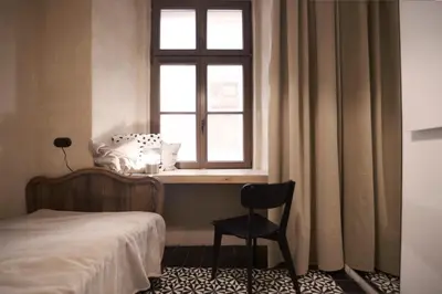 Łóżko lub łóżka w pokoju w obiekcie Charming apartment / Old Town City Center