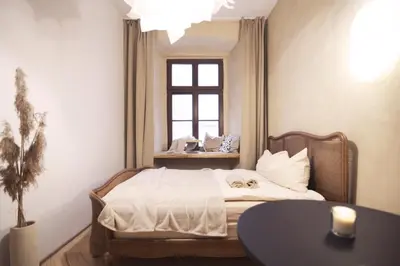 Łóżko lub łóżka w pokoju w obiekcie Charming apartment / Old Town City Center
