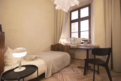 Łóżko lub łóżka w pokoju w obiekcie Charming apartment / Old Town City Center