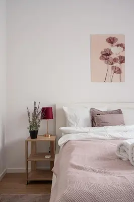 Łóżko lub łóżka w pokoju w obiekcie RentPlanet - Apartamenty Michalczyka