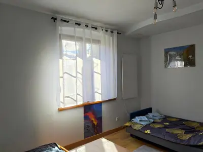 Łóżko lub łóżka w pokoju w obiekcie Strażnica Pod Lasem