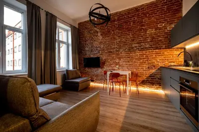 Telewizja i/lub zestaw kina domowego w obiekcie RentPlanet - Apartamenty Krasińskiego