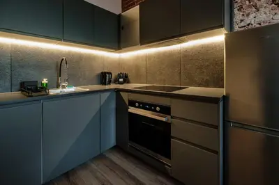 Kuchnia lub aneks kuchenny w obiekcie RentPlanet - Apartamenty Krasińskiego