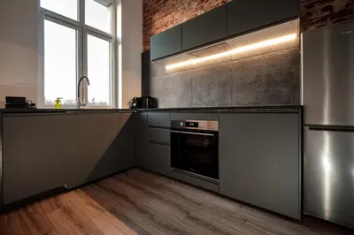 Kuchnia lub aneks kuchenny w obiekcie RentPlanet - Apartamenty Krasińskiego