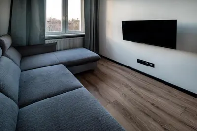 Telewizja i/lub zestaw kina domowego w obiekcie RentPlanet - Apartamenty Krasińskiego