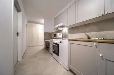 Kuchnia lub aneks kuchenny w obiekcie Madalińskiego Comfort Apartment by BookingHost