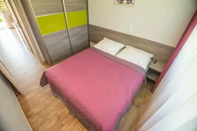 Łóżko lub łóżka w pokoju w obiekcie Ostoja