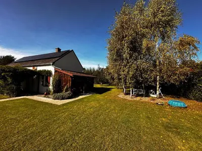 Ogród w obiekcie IDYLLAKI dom z ogrodem i sauną