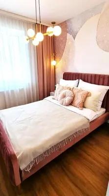Łóżko lub łóżka w pokoju w obiekcie Apartament Magnolia